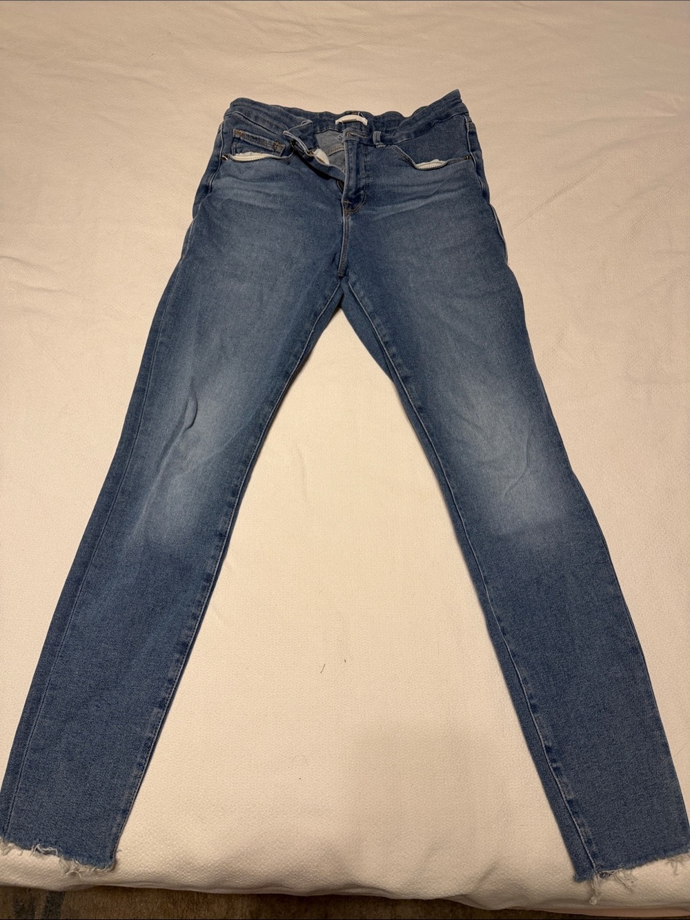 Good American raw hem straight cut